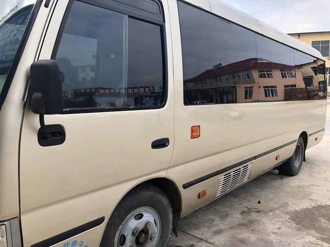 Verlaten de Passagiersdeur 23 van Toyota Mini Used Coaster Bus With Zetels1hz Dieselmotor