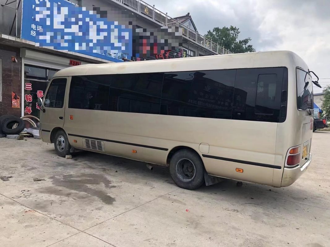 Verlaten de Passagiersdeur 23 van Toyota Mini Used Coaster Bus With Zetels1hz Dieselmotor