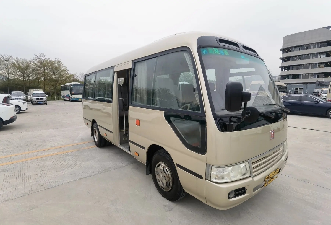 2de Hand Mini Bus Champagne Color 19 Zetels Front Engine Floding Door 6 Meters Gebruikte JMC-Onderlegger voor glazenjx6602