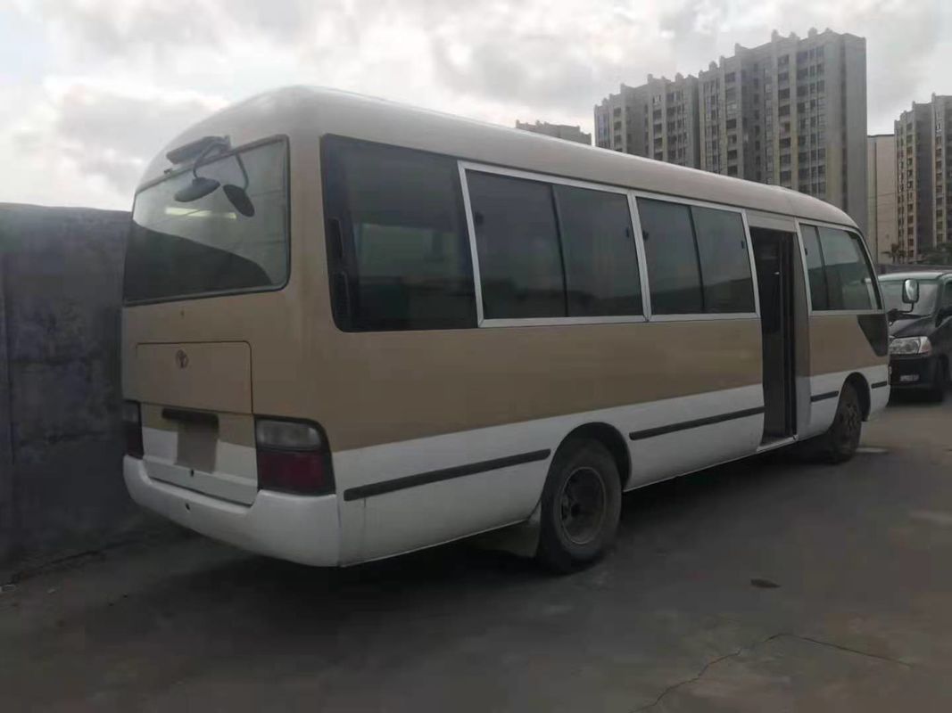 2010 Jaar 23 verliet de Zetels Gebruikte Onderlegger voor glazenbus, LHD Gebruikt Mini Bus Toyota Coaster Bus met Dieselmotor, Leiding