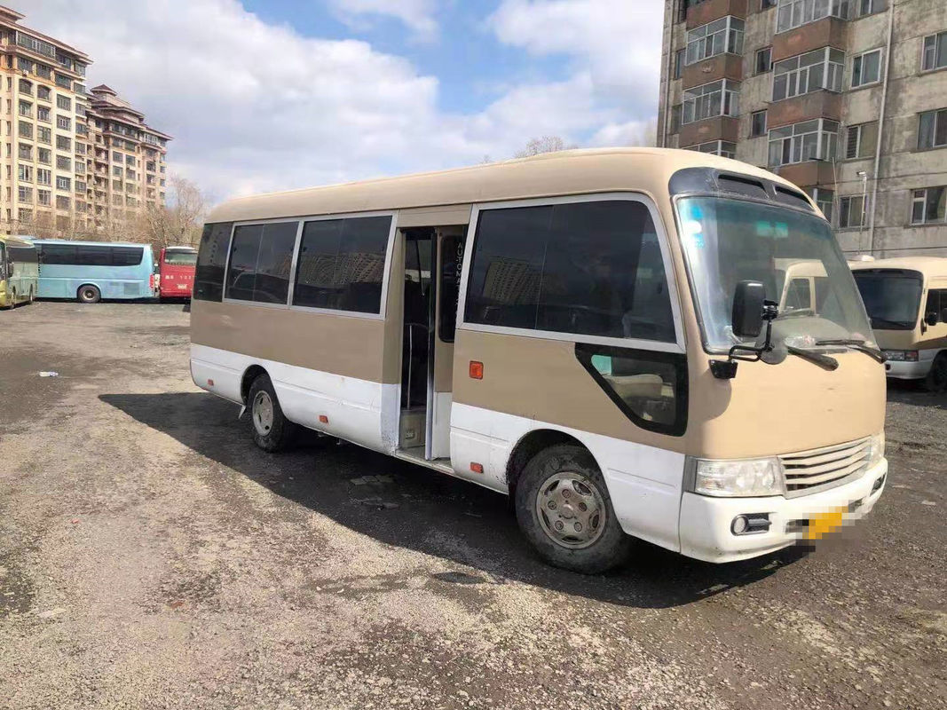 2010 Jaar 23 verliet de Zetels Gebruikte Onderlegger voor glazenbus, LHD Gebruikt Mini Bus Toyota Coaster Bus met Dieselmotor, Leiding