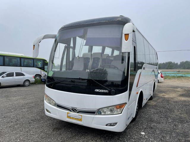 De gebruikte Kinglong-het Staalchassis van Busxmq6859 37 Zetels kiezen Bus van de de Motor Euro III Gebruikte Reis van Deuryuchia de Achter uit