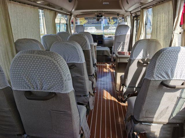 De Gebruikte Bus van Toyota Onderlegger voor glazen met Volledig Materiaal 20 de Zetels Gebruikte van het het Jaar Glijdende Venster van Mini Bus In 2012 Bus van de Benzinemunual