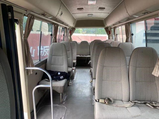 2011 Jaar 18 verliet de Zetels Gebruikte Onderlegger voor glazenbus, LHD Gebruikt Mini Bus Toyota Coaster Bus met 2TR-Benzinemotor, Leiding